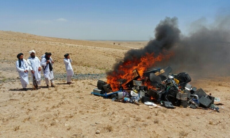 Taliban create bonfire of ‘immoral’ music equipment equipment . Taliban create