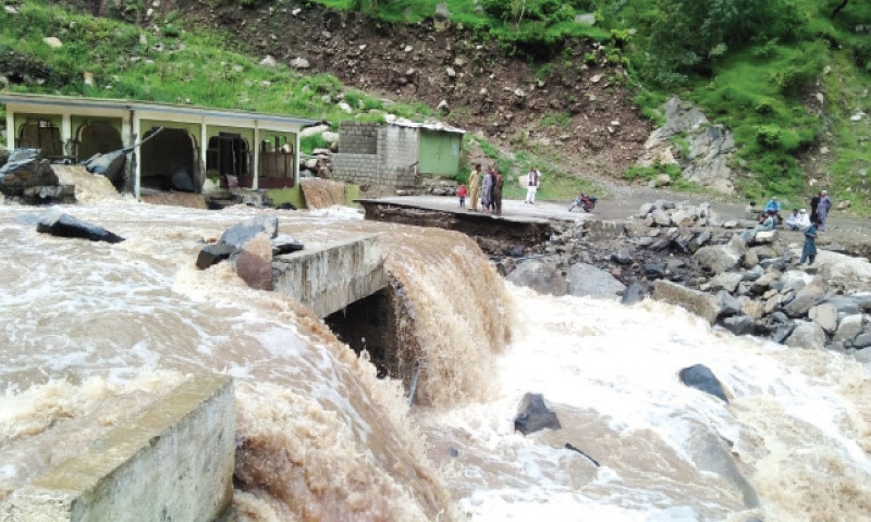 Travellers stranded as flood damages bridge in KP’s Mansehra . Flood