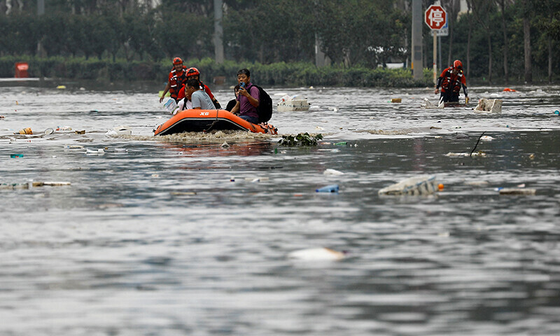 China intensifies flood rescue efforts south of Beijing after historic rains . Flooding efforts south
