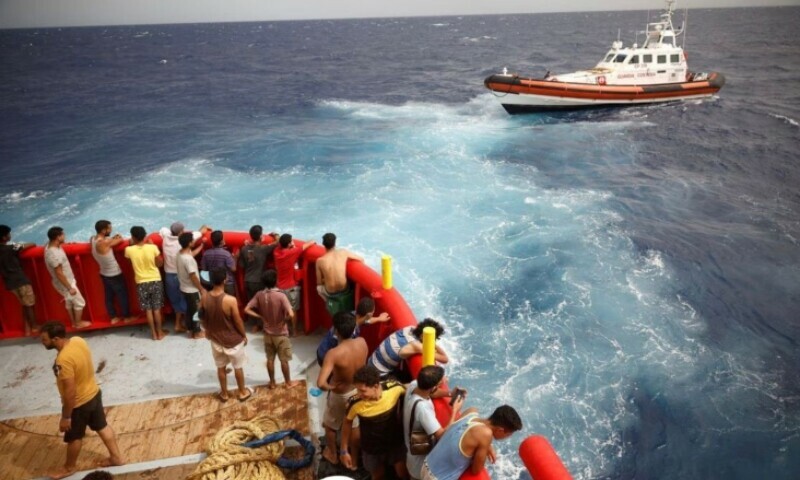 2 dead, 57 rescued from migrant shipwrecks off Italy’s L